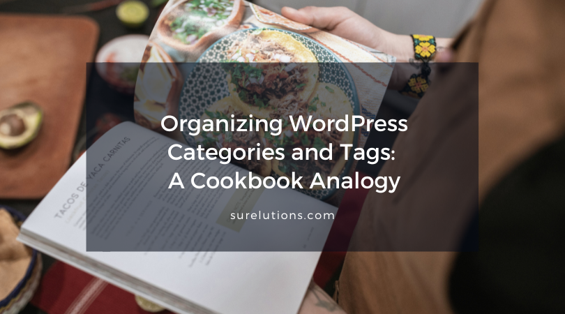 Closeup of person holding an open cookbook.